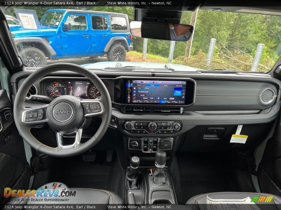 Dashboard of 2024 Jeep Wrangler 4-Door Sahara 4x4 Photo #20