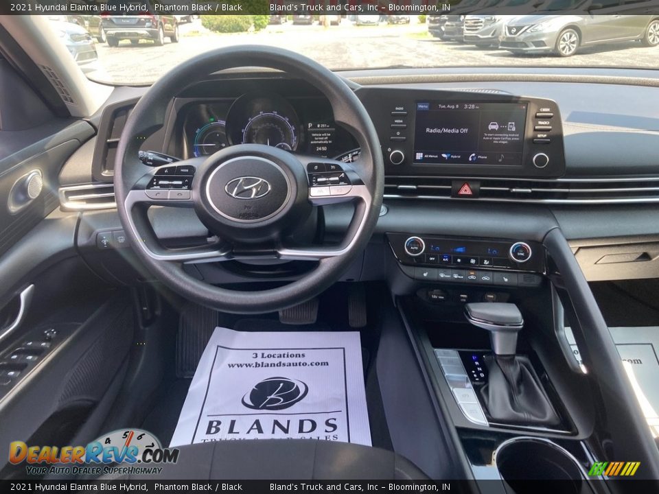 Dashboard of 2021 Hyundai Elantra Blue Hybrid Photo #17