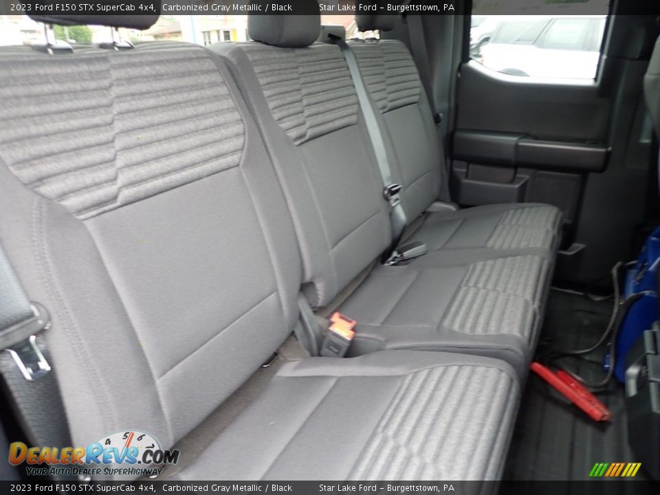 Rear Seat of 2023 Ford F150 STX SuperCab 4x4 Photo #10
