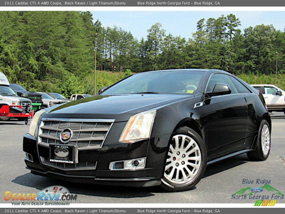 Front 3/4 View of 2011 Cadillac CTS 4 AWD Coupe Photo #1