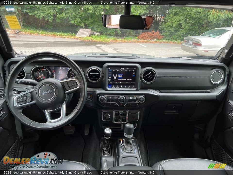 Dashboard of 2022 Jeep Wrangler Unlimited Sahara 4x4 Photo #10