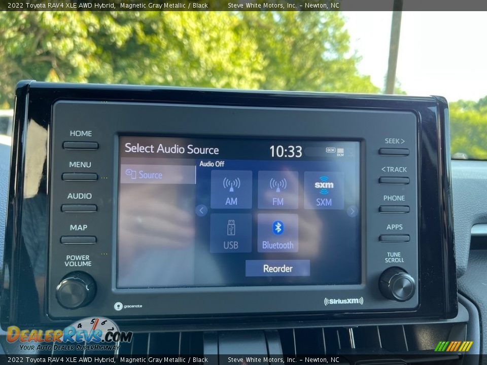 Controls of 2022 Toyota RAV4 XLE AWD Hybrid Photo #20