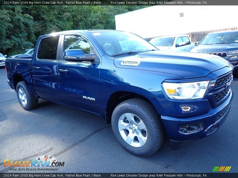 Front 3/4 View of 2024 Ram 1500 Big Horn Crew Cab 4x4 Photo #9