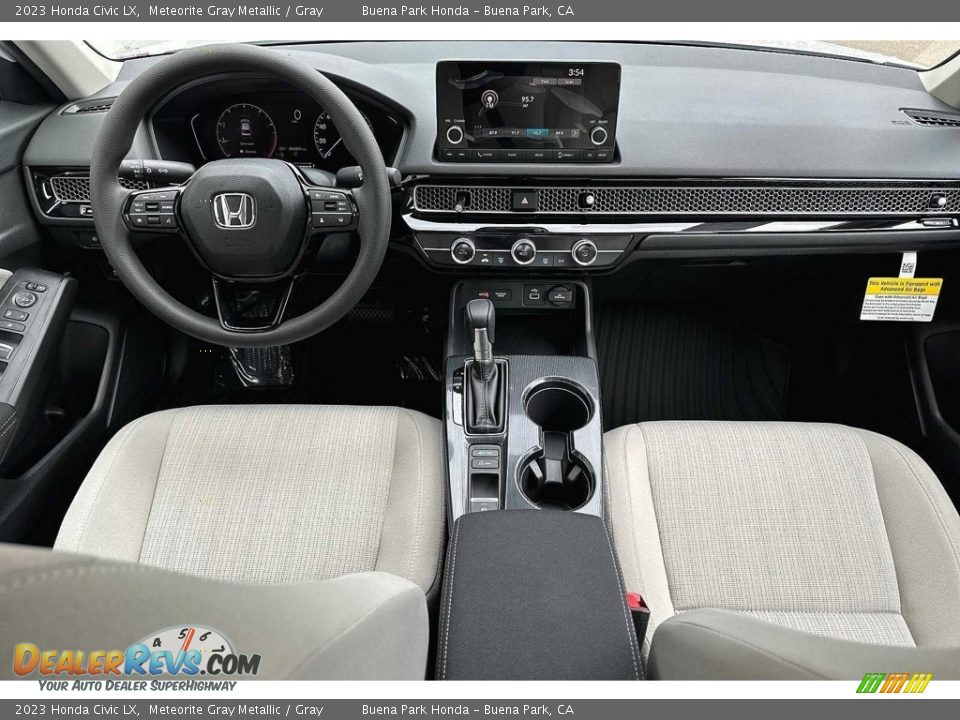 Dashboard of 2023 Honda Civic LX Photo #10