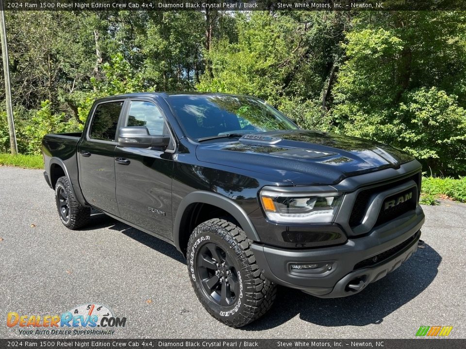 Front 3/4 View of 2024 Ram 1500 Rebel Night Edition Crew Cab 4x4 Photo #4