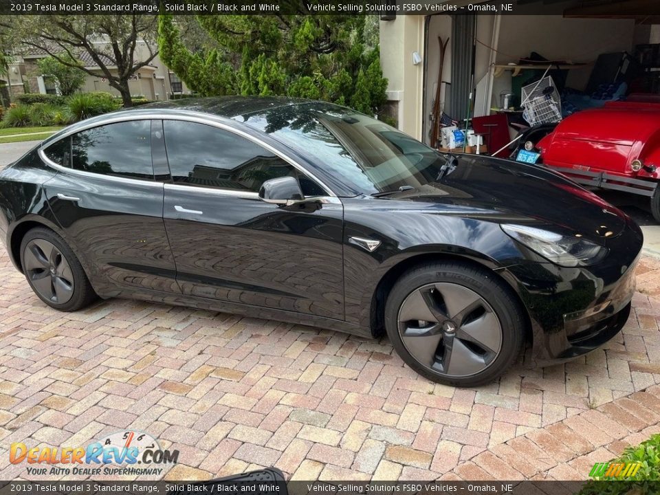 Solid Black 2019 Tesla Model 3 Standard Range Photo #1