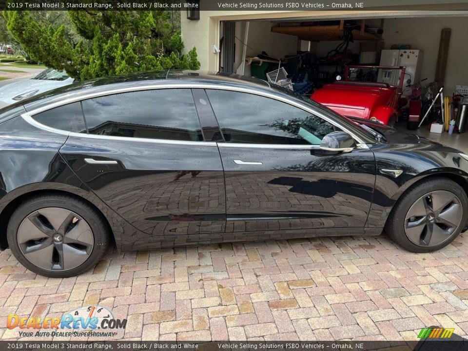 2019 Tesla Model 3 Standard Range Solid Black / Black and White Photo #3