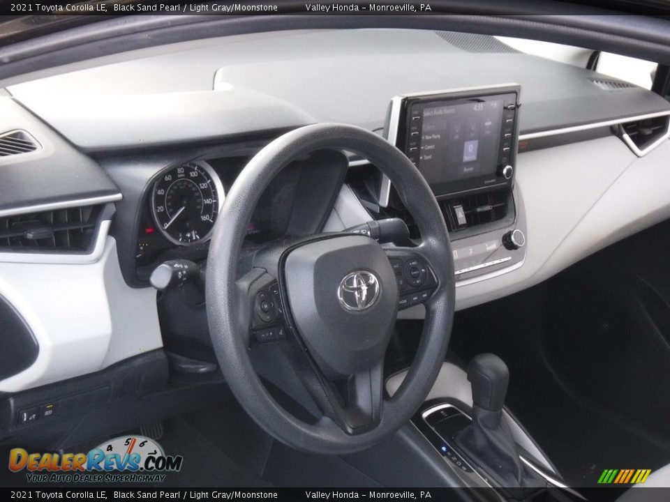 Dashboard of 2021 Toyota Corolla LE Photo #9