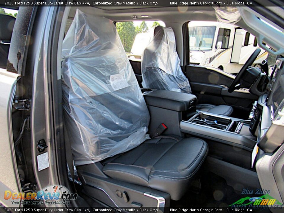 Front Seat of 2023 Ford F250 Super Duty Lariat Crew Cab 4x4 Photo #12