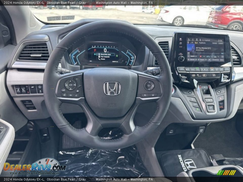 Dashboard of 2024 Honda Odyssey EX-L Photo #12