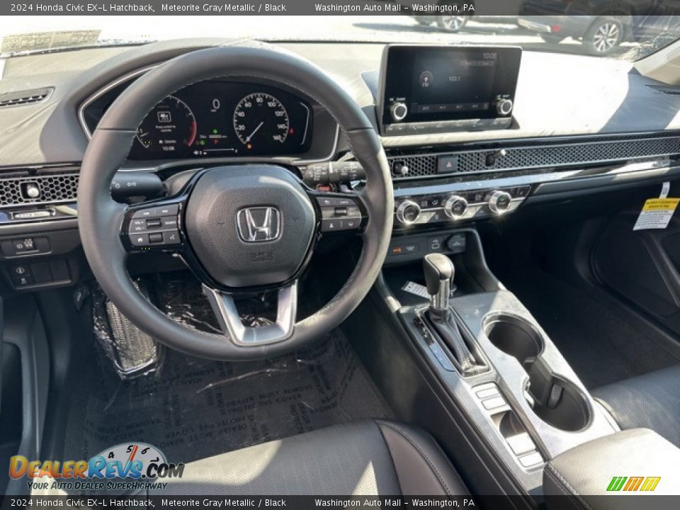 Dashboard of 2024 Honda Civic EX-L Hatchback Photo #13