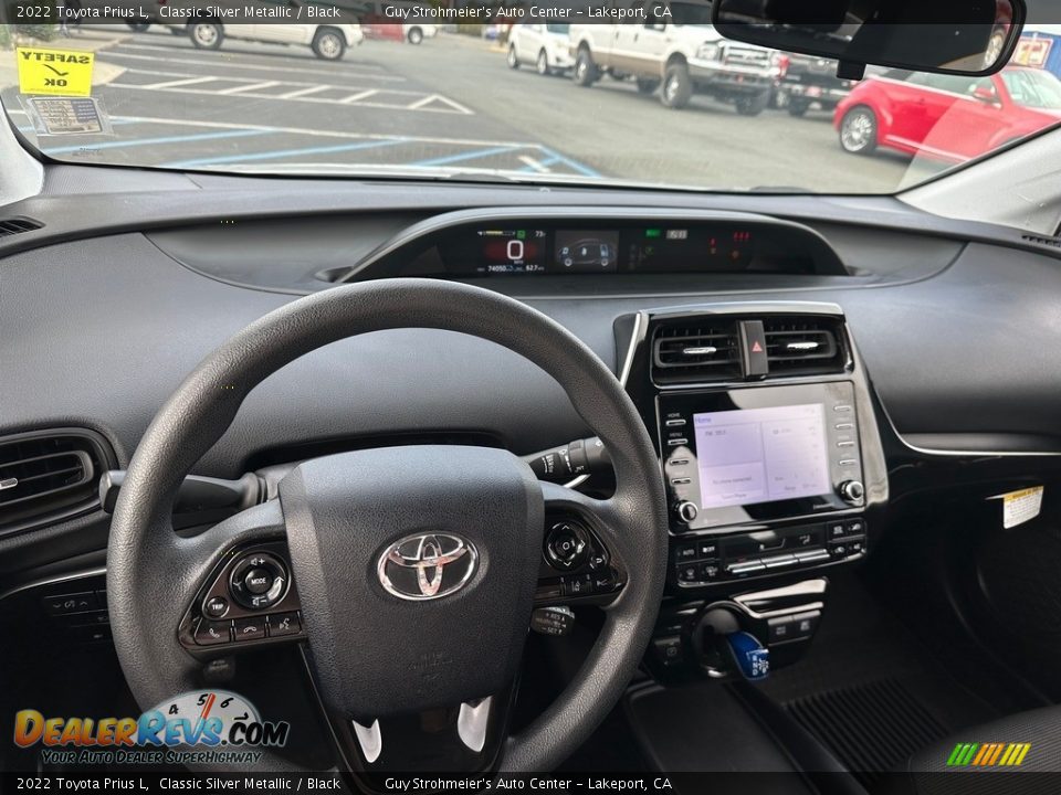 Dashboard of 2022 Toyota Prius L Photo #9