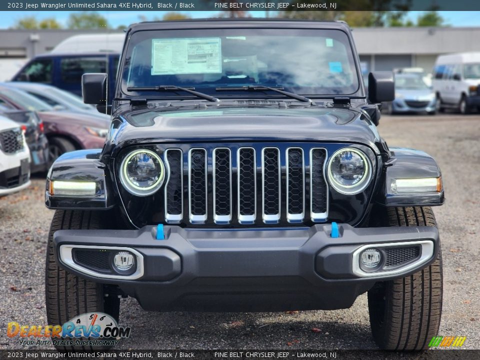 Black 2023 Jeep Wrangler Unlimited Sahara 4XE Hybrid Photo #2