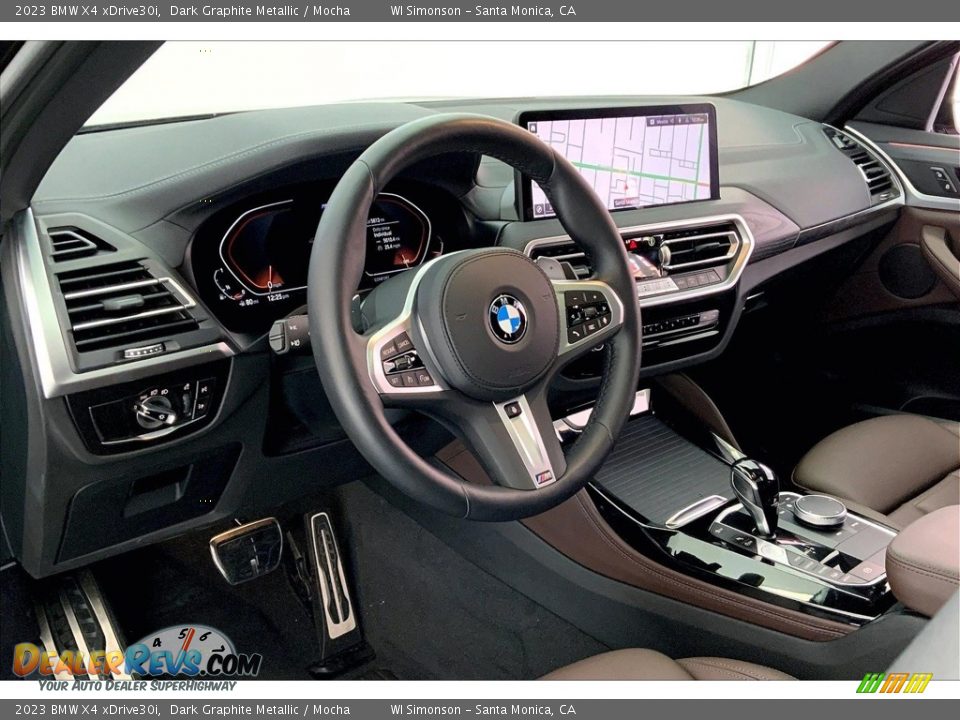 Dashboard of 2023 BMW X4 xDrive30i Photo #13
