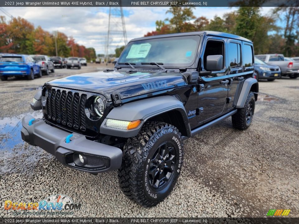 Front 3/4 View of 2023 Jeep Wrangler Unlimited Willys 4XE Hybrid Photo #1