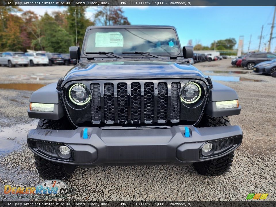 Black 2023 Jeep Wrangler Unlimited Willys 4XE Hybrid Photo #2