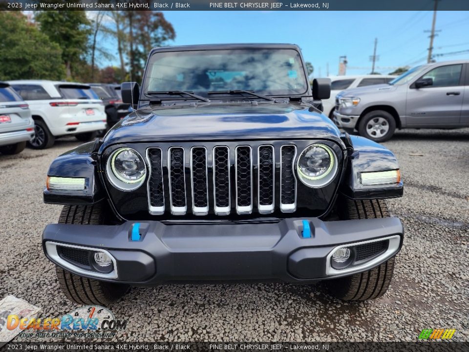 Black 2023 Jeep Wrangler Unlimited Sahara 4XE Hybrid Photo #2