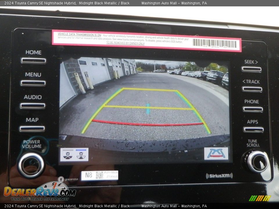 Controls of 2024 Toyota Camry SE Nightshade Hybrid Photo #17