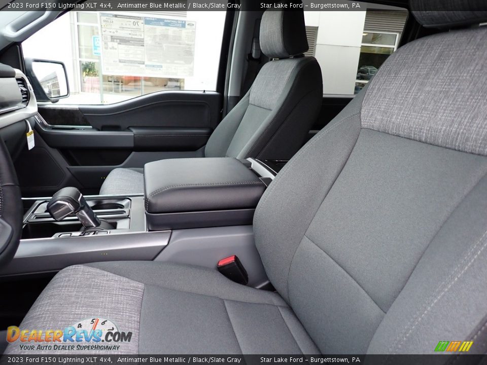 Front Seat of 2023 Ford F150 Lightning XLT 4x4 Photo #11