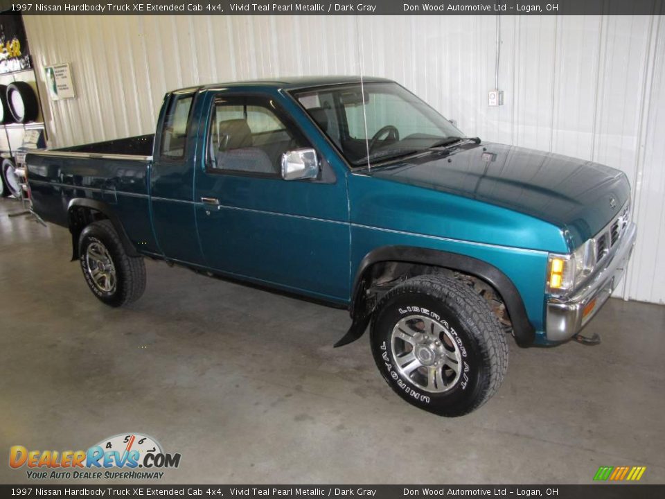 1997 Nissan Hardbody Truck XE Extended Cab 4x4 Vivid Teal Pearl Metallic / Dark Gray Photo #1