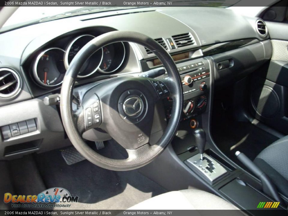 2006 Mazda MAZDA3 i Sedan Sunlight Silver Metallic / Black Photo #6
