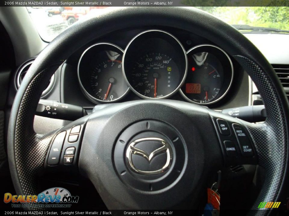 2006 Mazda MAZDA3 i Sedan Sunlight Silver Metallic / Black Photo #12