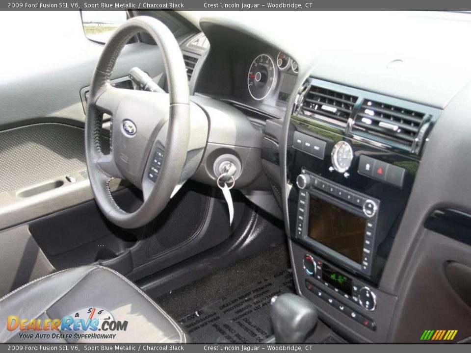 2009 Ford Fusion SEL V6 Sport Blue Metallic / Charcoal Black Photo #13