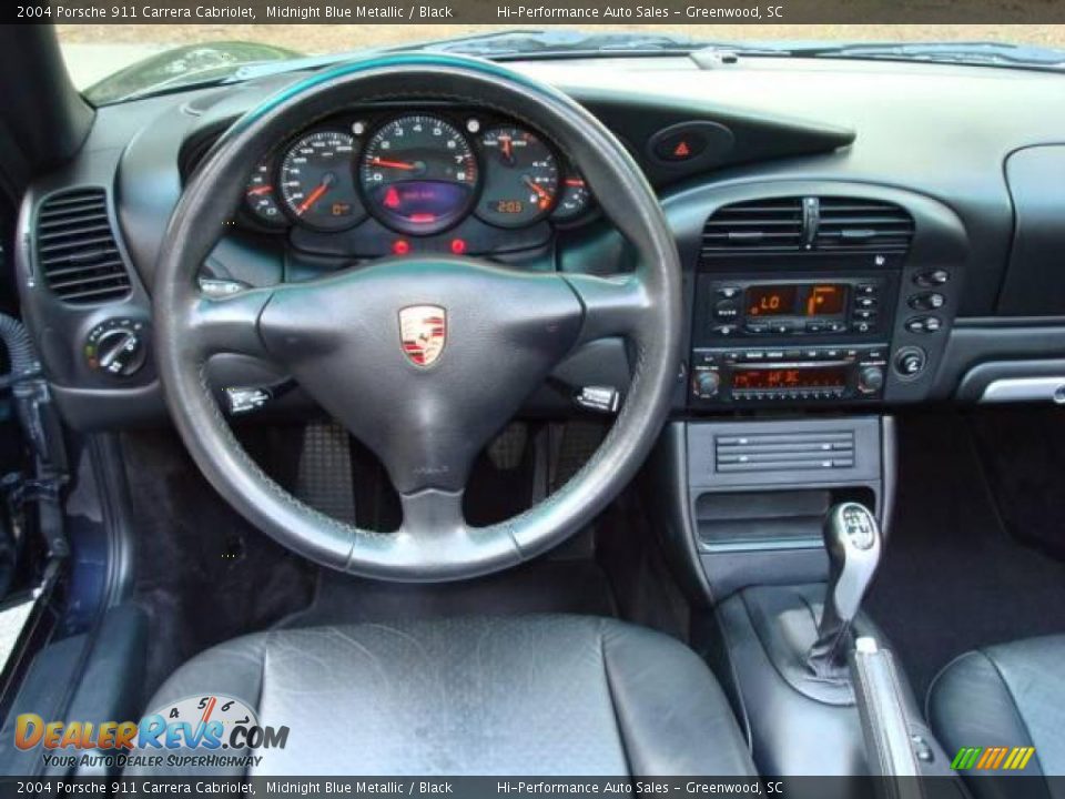 Dashboard of 2004 Porsche 911 Carrera Cabriolet Photo #35