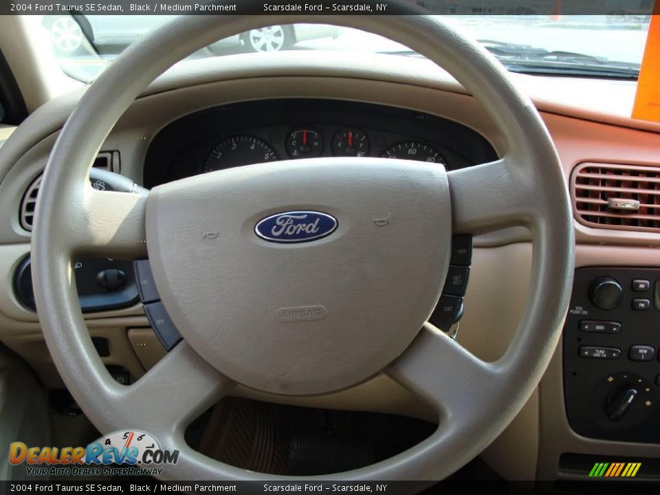 2004 Ford Taurus SE Sedan Black / Medium Parchment Photo #17