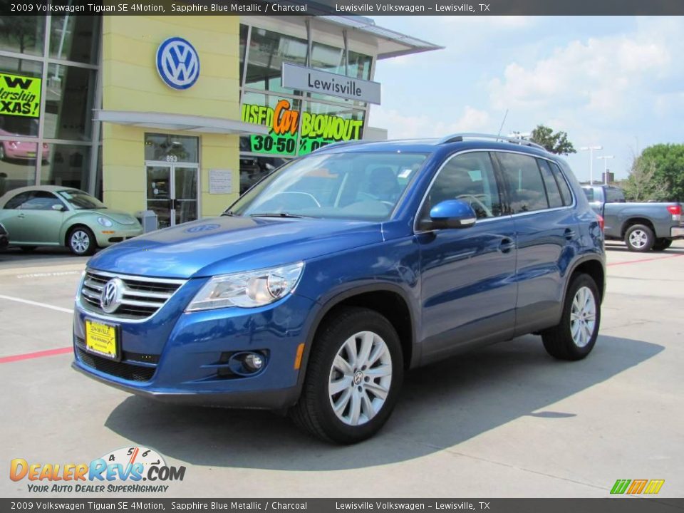 2009 Volkswagen Tiguan SE 4Motion Sapphire Blue Metallic / Charcoal Photo #1