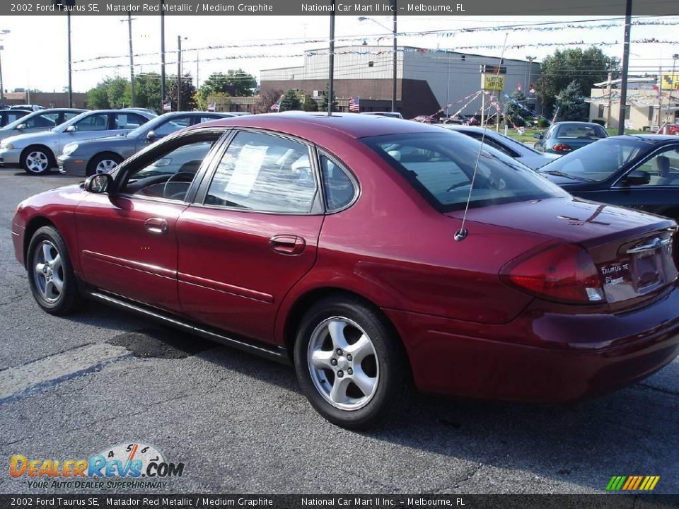 2002 Ford Taurus SE Matador Red Metallic / Medium Graphite Photo #6