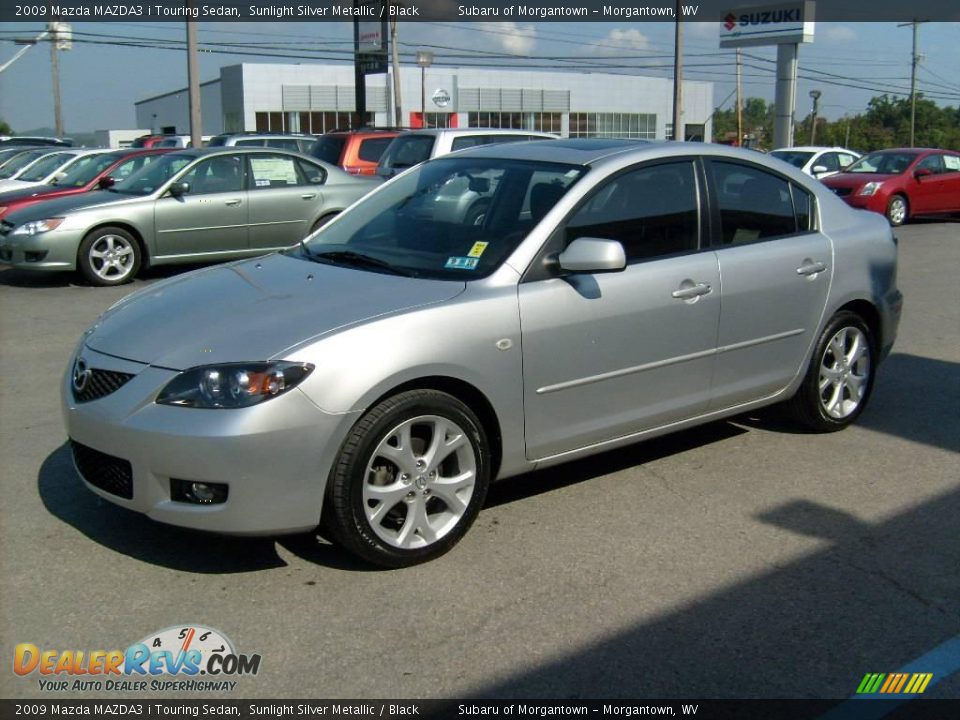 2009 Mazda MAZDA3 i Touring Sedan Sunlight Silver Metallic / Black Photo #3