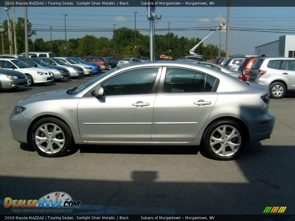 2009 Mazda MAZDA3 i Touring Sedan Sunlight Silver Metallic / Black Photo #4
