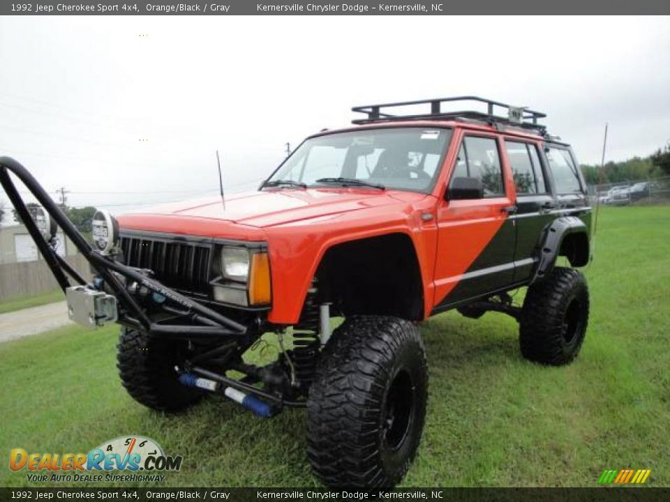 1992 Jeep Cherokee Sport 4x4 Orange/Black / Gray Photo #1