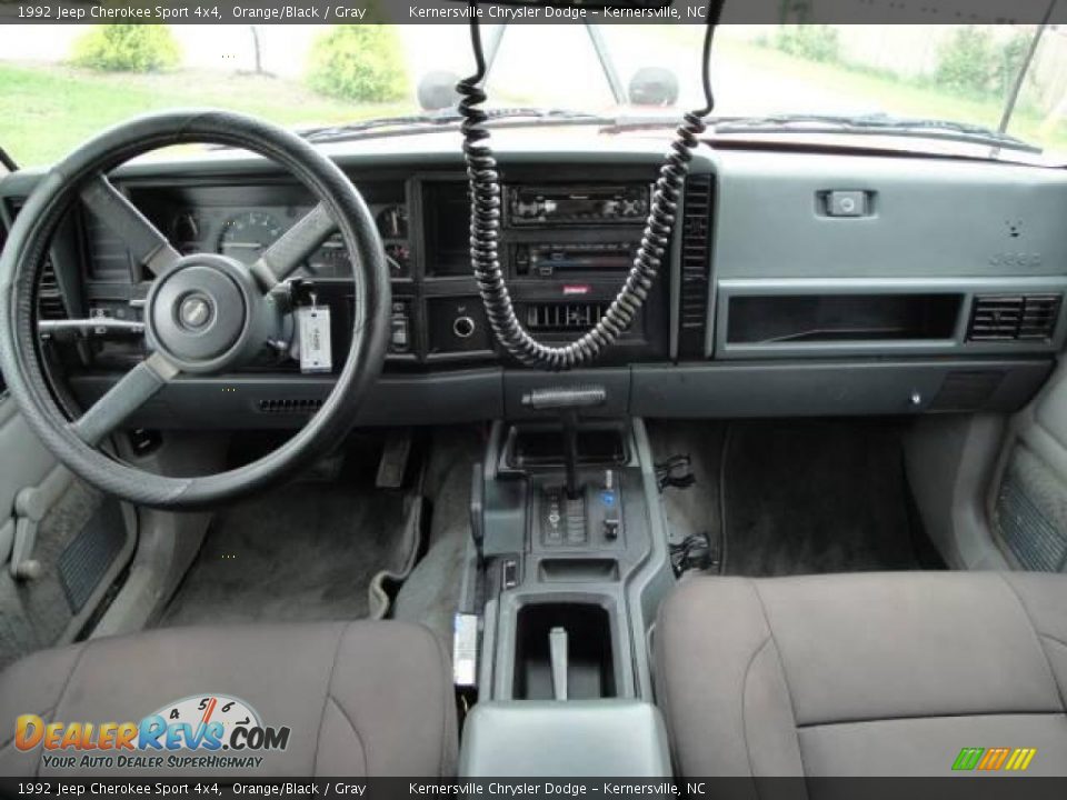 1992 Jeep Cherokee Sport 4x4 Orange/Black / Gray Photo #32