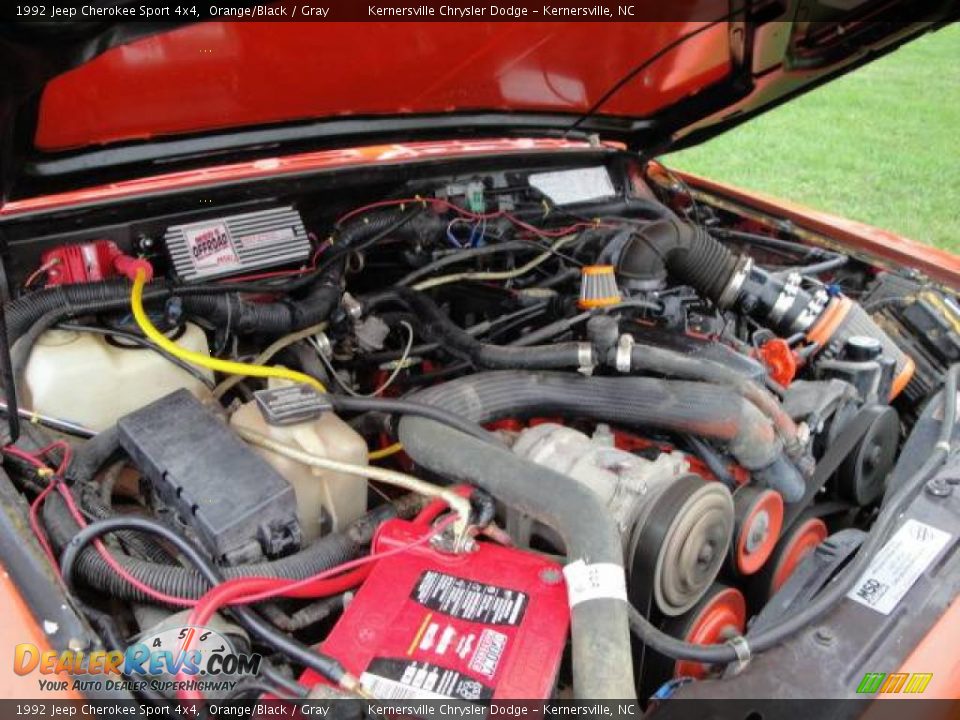 1992 Jeep Cherokee Sport 4x4 Orange/Black / Gray Photo #36