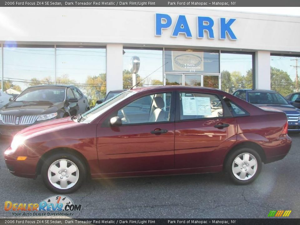 2006 Ford Focus ZX4 SE Sedan Dark Toreador Red Metallic / Dark Flint/Light Flint Photo #1