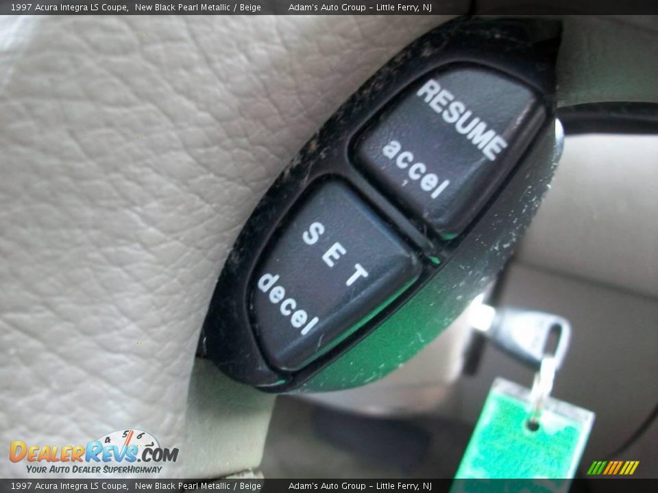 1997 Acura Integra LS Coupe New Black Pearl Metallic / Beige Photo #24