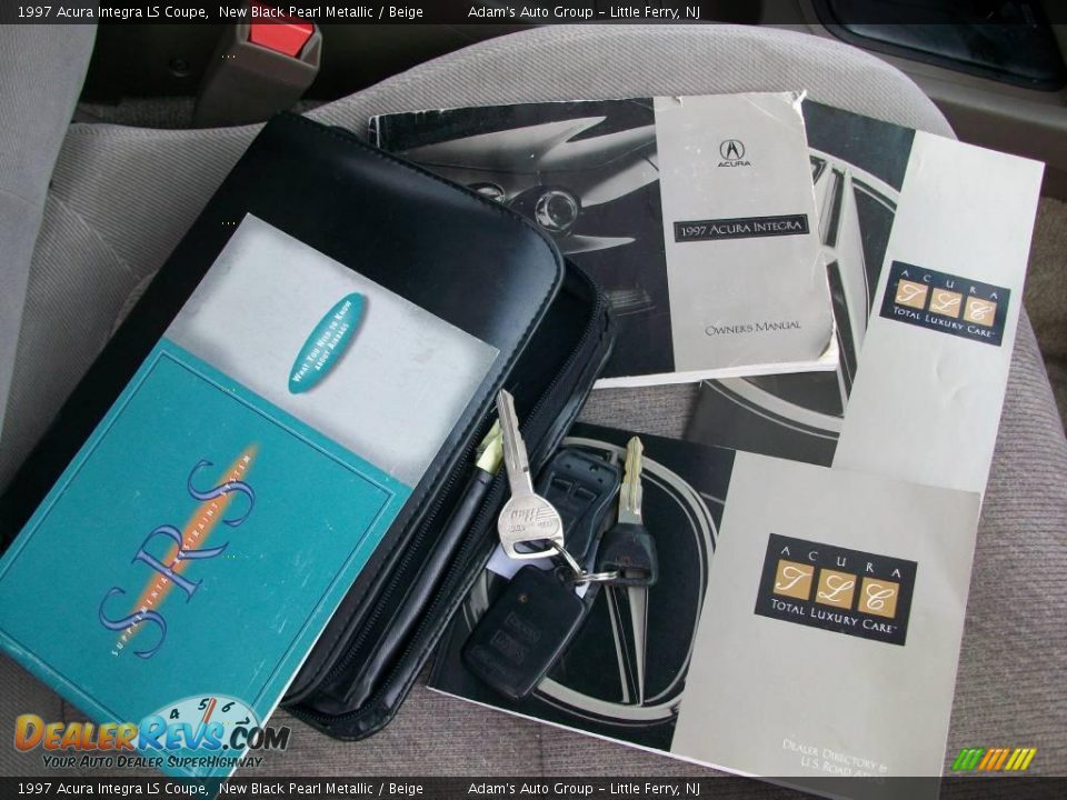 1997 Acura Integra LS Coupe New Black Pearl Metallic / Beige Photo #25