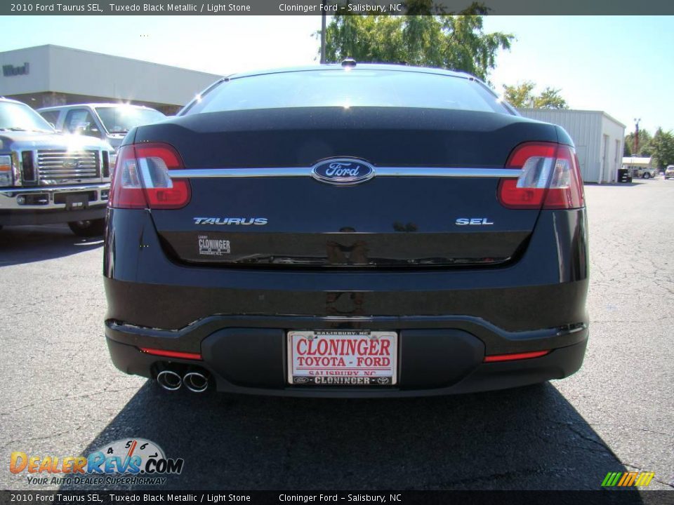 2010 Ford Taurus SEL Tuxedo Black Metallic / Light Stone Photo #4