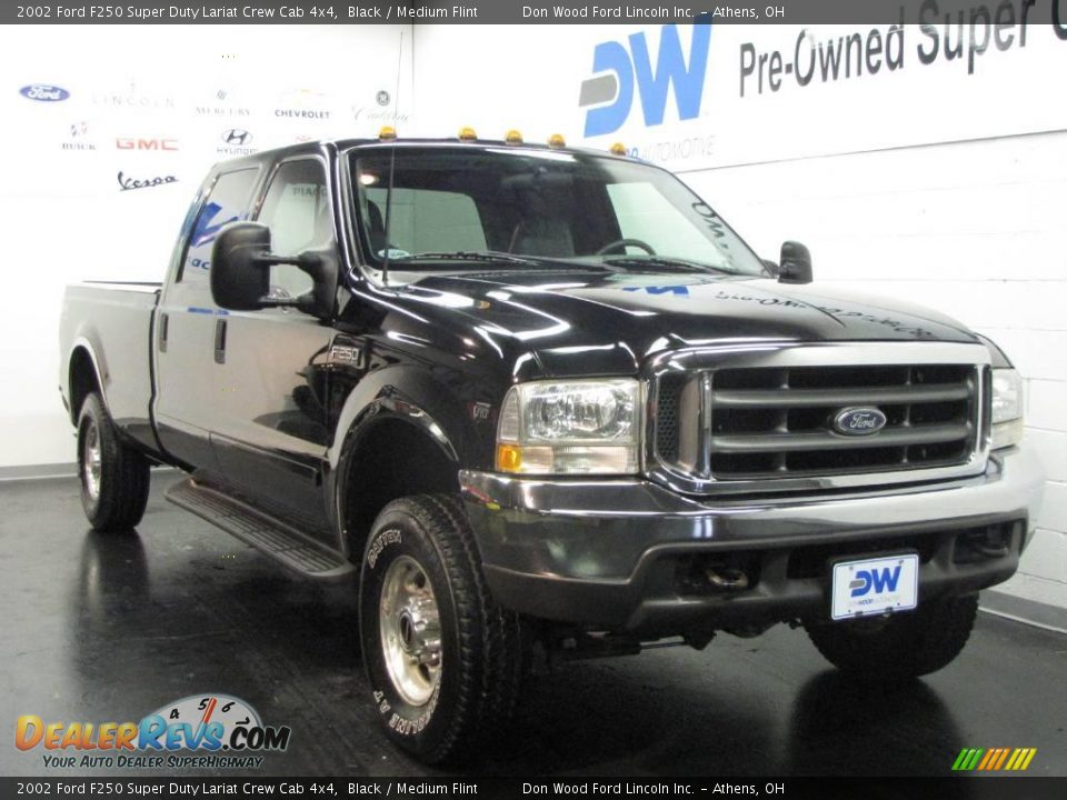 2002 Ford F250 Super Duty Lariat Crew Cab 4x4 Black / Medium Flint Photo #1