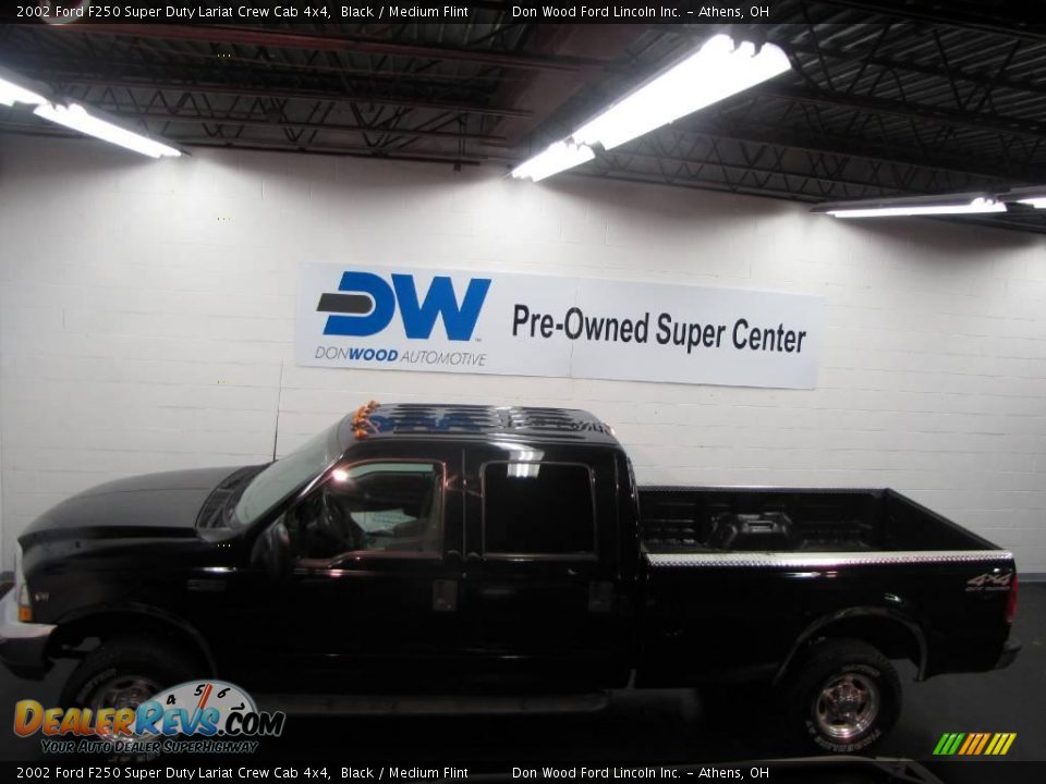 2002 Ford F250 Super Duty Lariat Crew Cab 4x4 Black / Medium Flint Photo #5