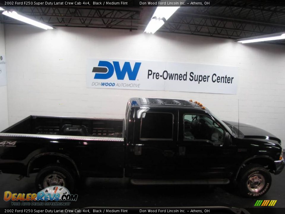 2002 Ford F250 Super Duty Lariat Crew Cab 4x4 Black / Medium Flint Photo #6