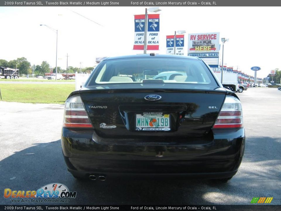 2009 Ford Taurus SEL Tuxedo Black Metallic / Medium Light Stone Photo #4