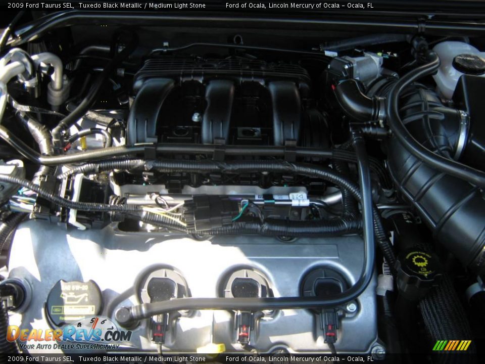2009 Ford Taurus SEL Tuxedo Black Metallic / Medium Light Stone Photo #27