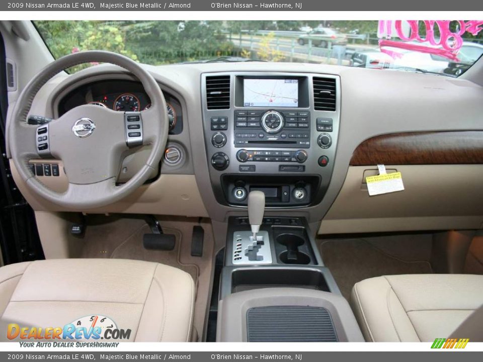 2009 Nissan Armada LE 4WD Majestic Blue Metallic / Almond Photo #13
