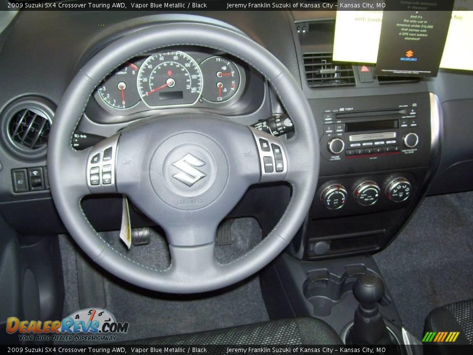2009 Suzuki SX4 Crossover Touring AWD Vapor Blue Metallic / Black Photo #9