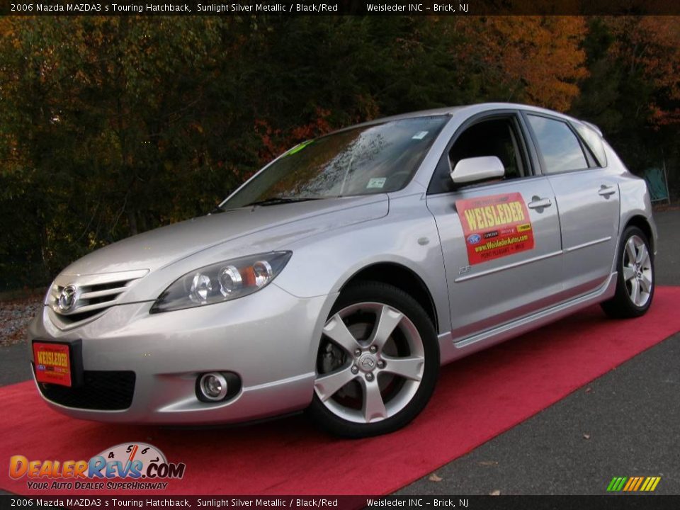 2006 Mazda MAZDA3 s Touring Hatchback Sunlight Silver Metallic / Black/Red Photo #1