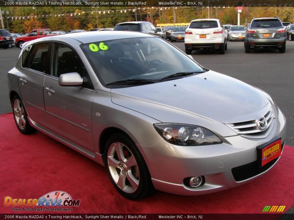 2006 Mazda MAZDA3 s Touring Hatchback Sunlight Silver Metallic / Black/Red Photo #3