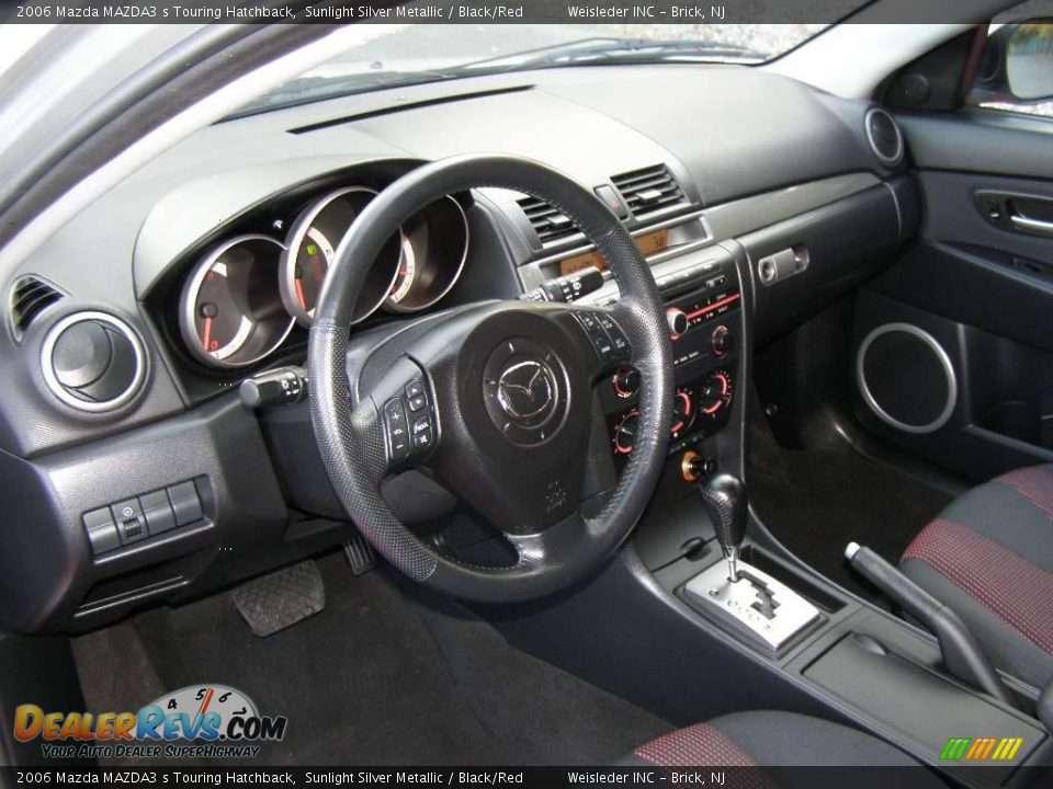 2006 Mazda MAZDA3 s Touring Hatchback Sunlight Silver Metallic / Black/Red Photo #11